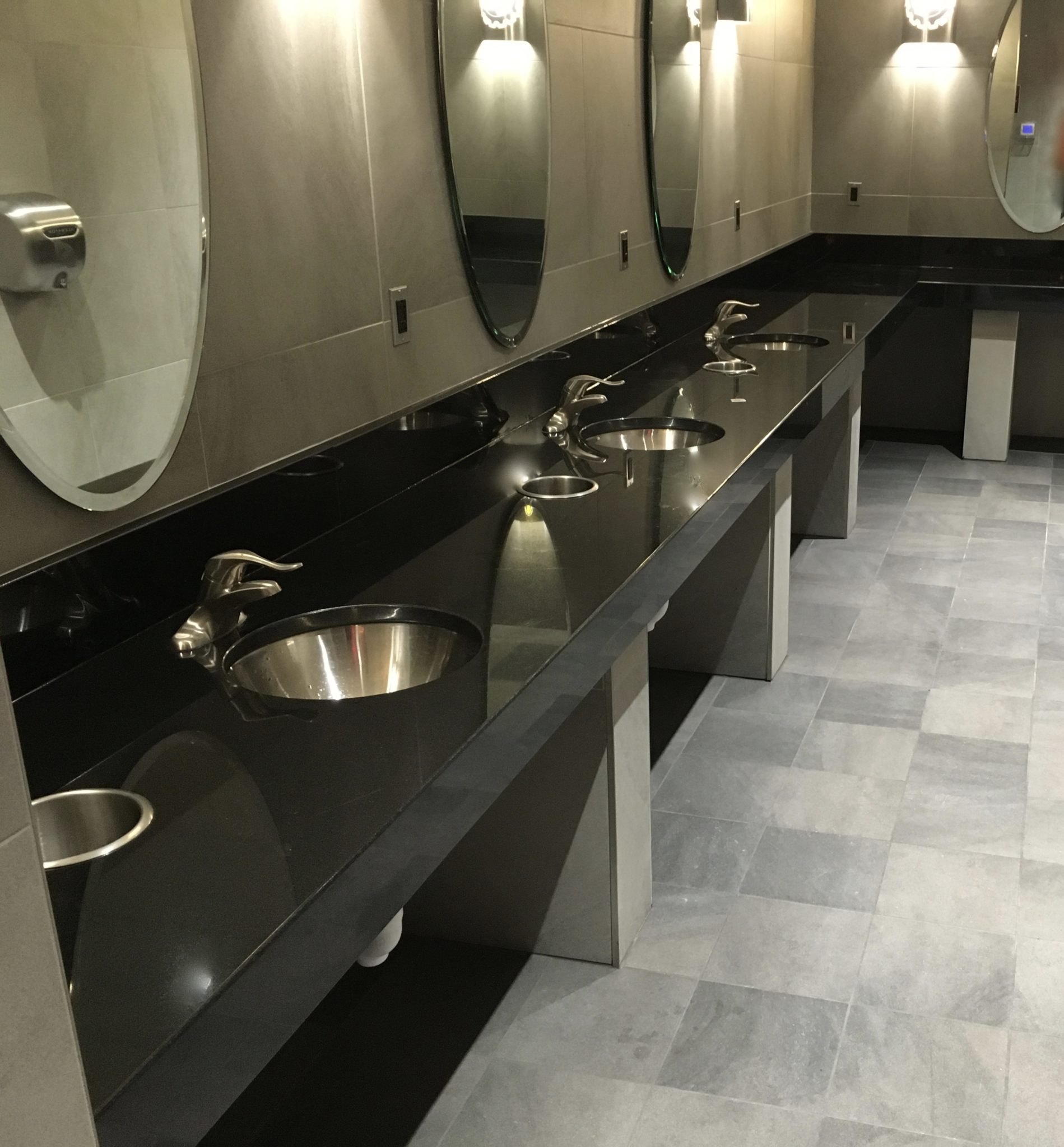 Granite countertops Club Fitness bathroom