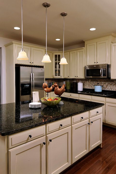 Dark Countertops with Cream Cabinets